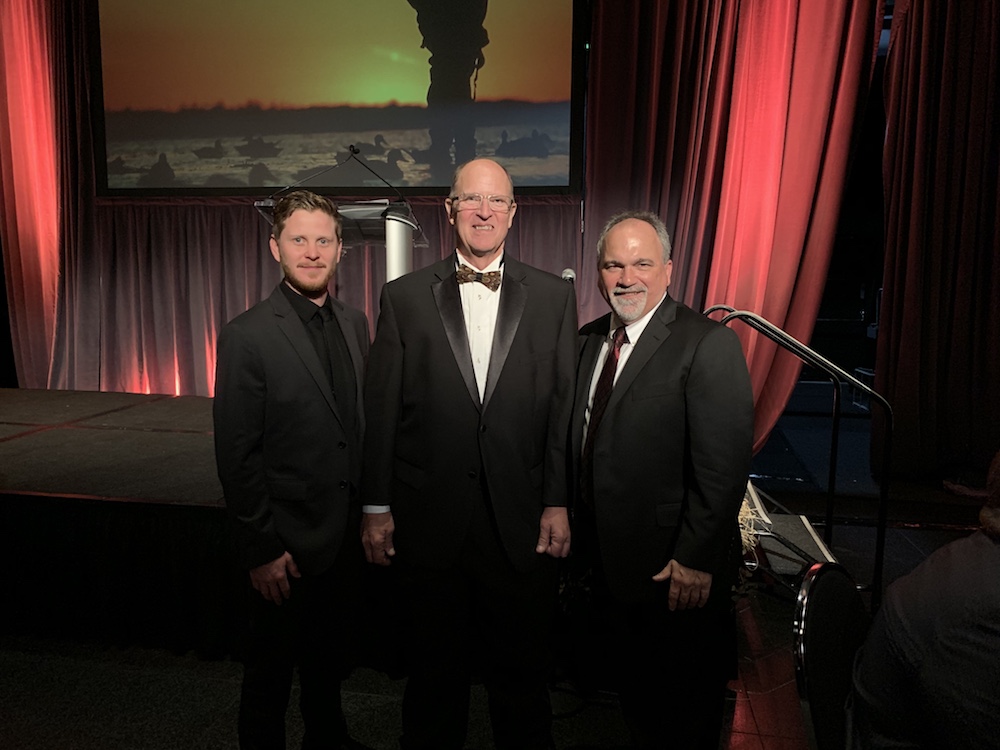 Luke Matthews, Paul Bonderson, and Paul Buttner group photo at awards event