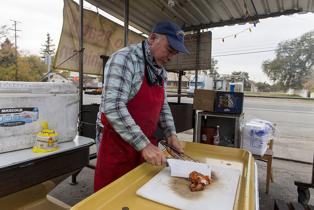 man cooking barbecue