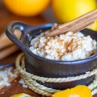 Homemade rice pudding dessert with lemon, orange and cinnamon flavor